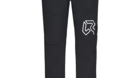 Black softshell pants with zippered pockets and reflective logo. © Rock Experience