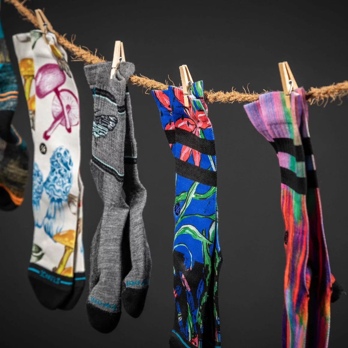 Colorful socks hanging on a clothesline. © Sport Kessler GmbH