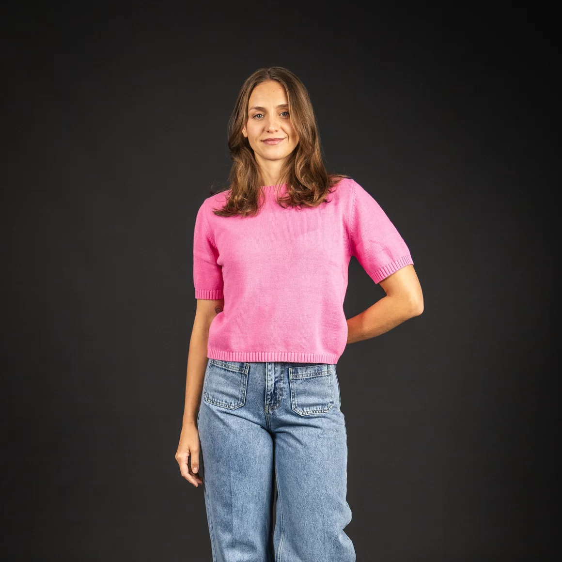 Woman in pink sweater and jeans © Sport Kessler GmbH