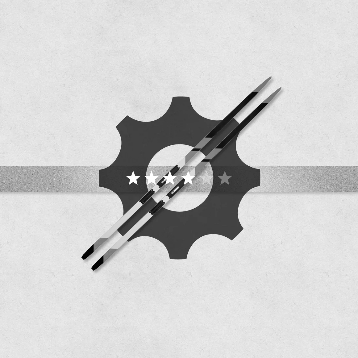 Cross-country skis and a gear logo with four stars. © Sport Kessler GmbH